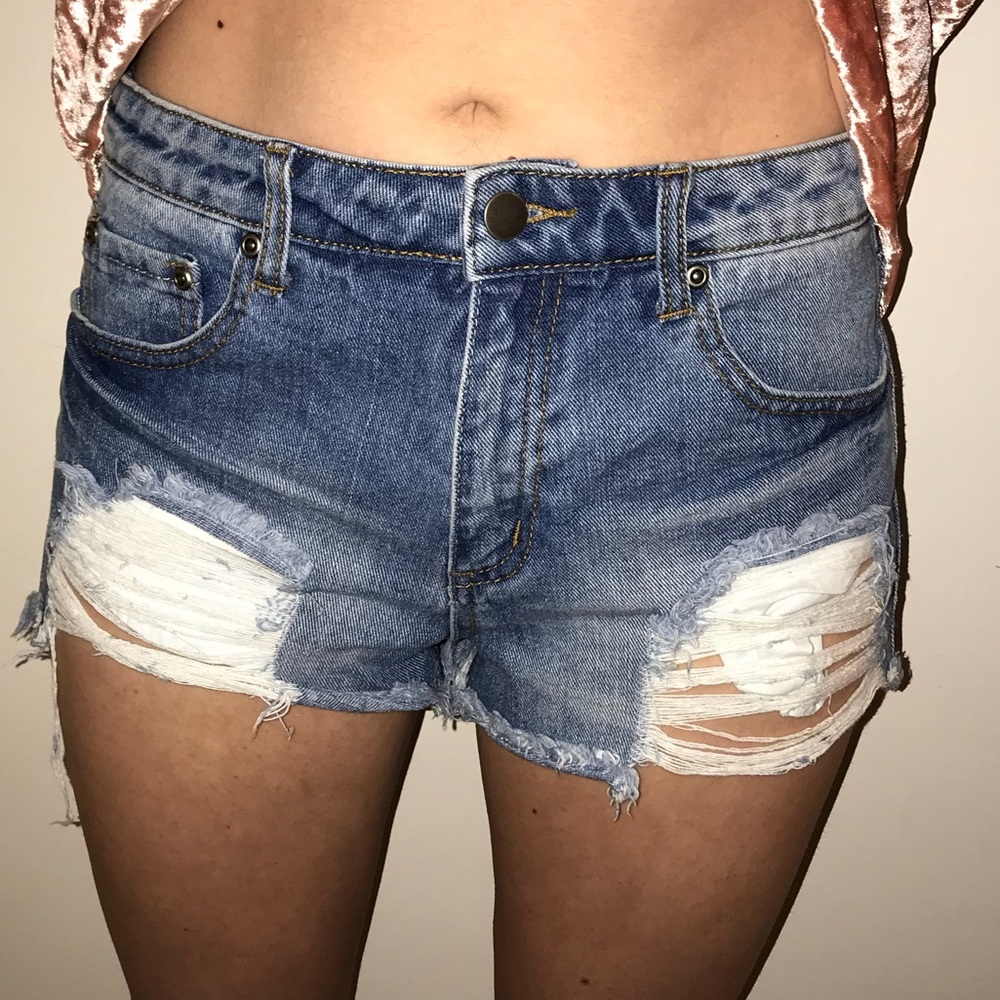 Distressed denim shorts